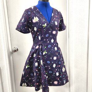 Purple mini dress with space monster theme print